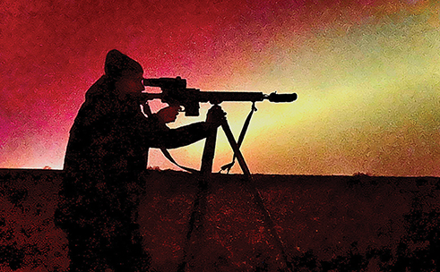 The author preparing for a shot during the aurora borealis with a Rock River Predator HP LAR-BT3 chambered in 243, an InfiRay RICO G-LRF Thermal optic, a SilencerCo Omega 36M Suppressor and a Santa Claus Optics Tripod.
